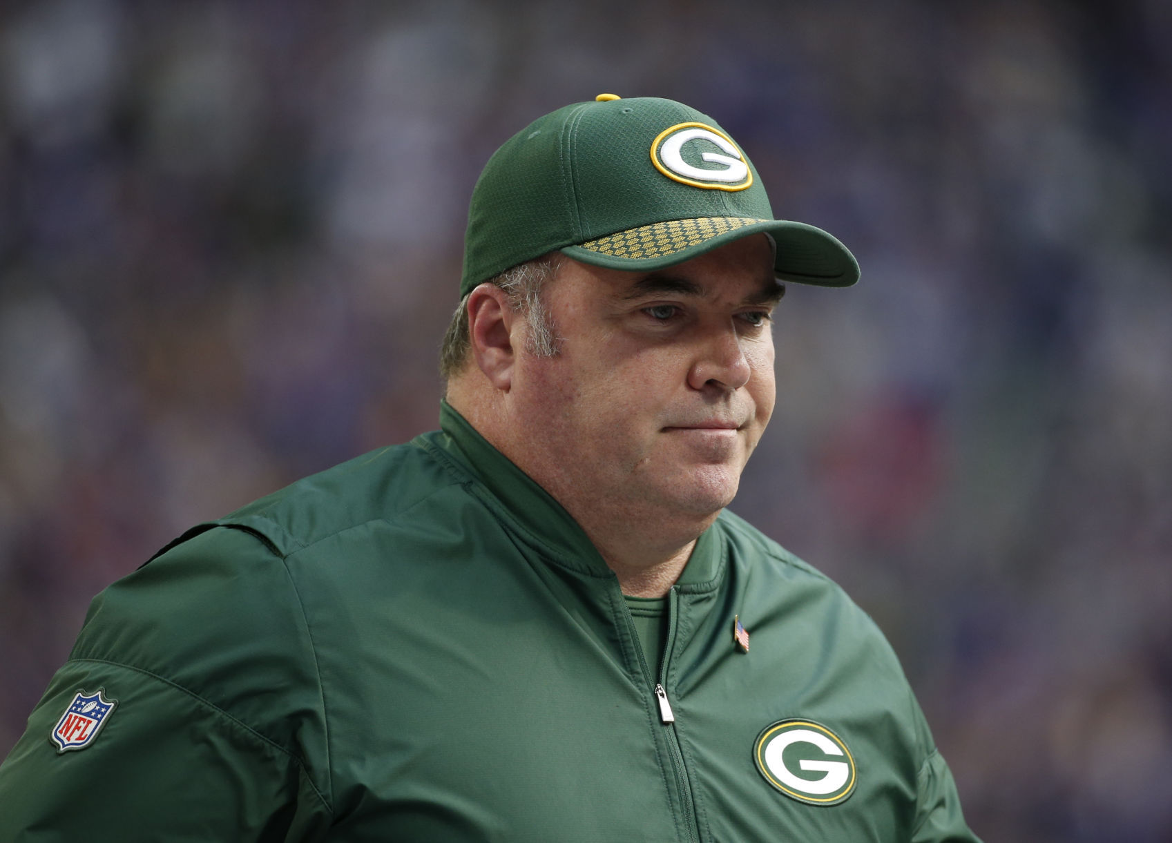 Mike McCarthy watches second half